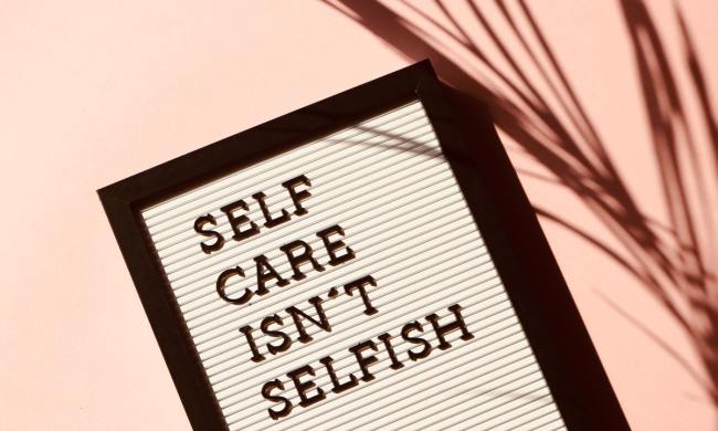 sign that says self care isn't selfish