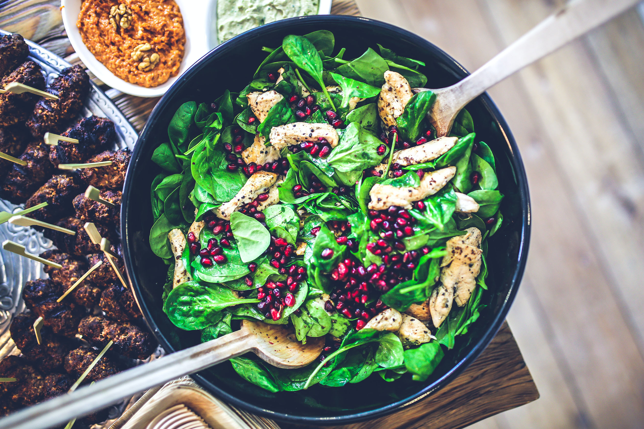 Spinach, chicken, and pomegranate salad