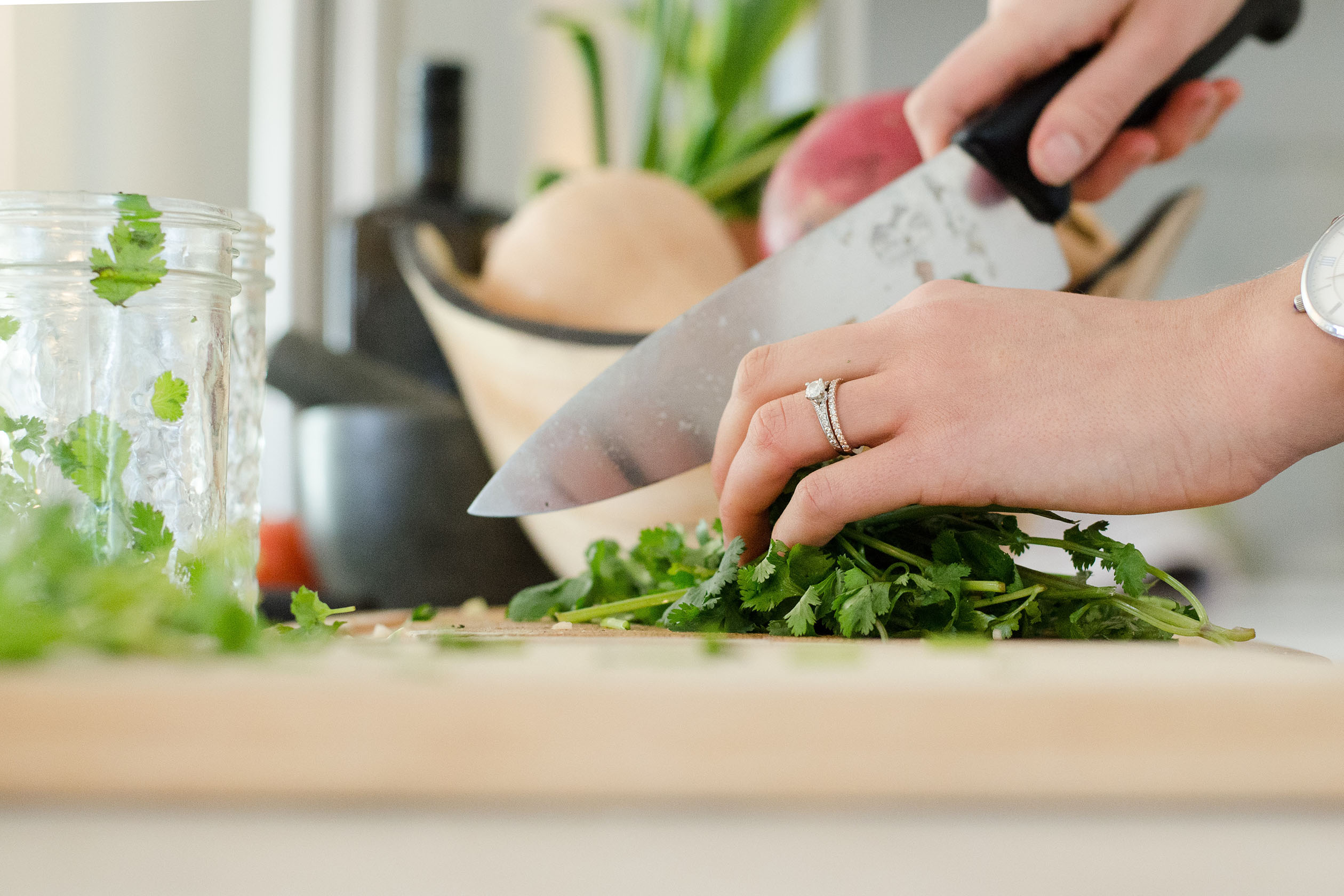 Woman chopping herbs
