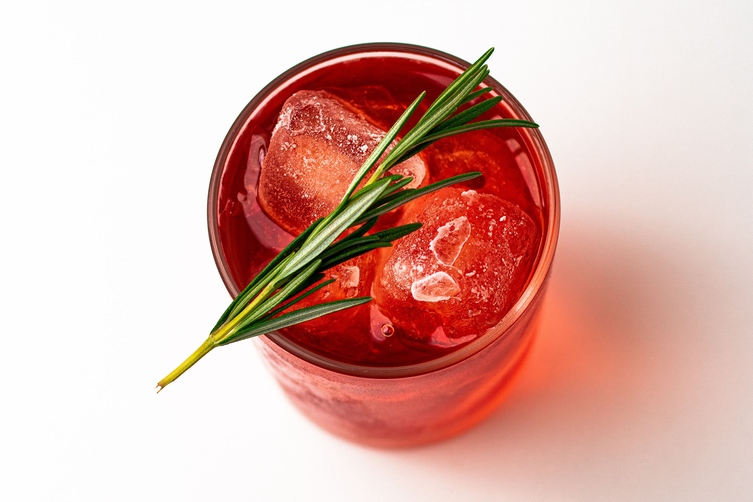 Negroni with rosemary garnish