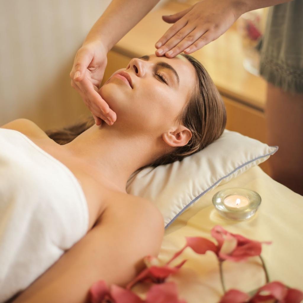A woman relaxing at a spa.