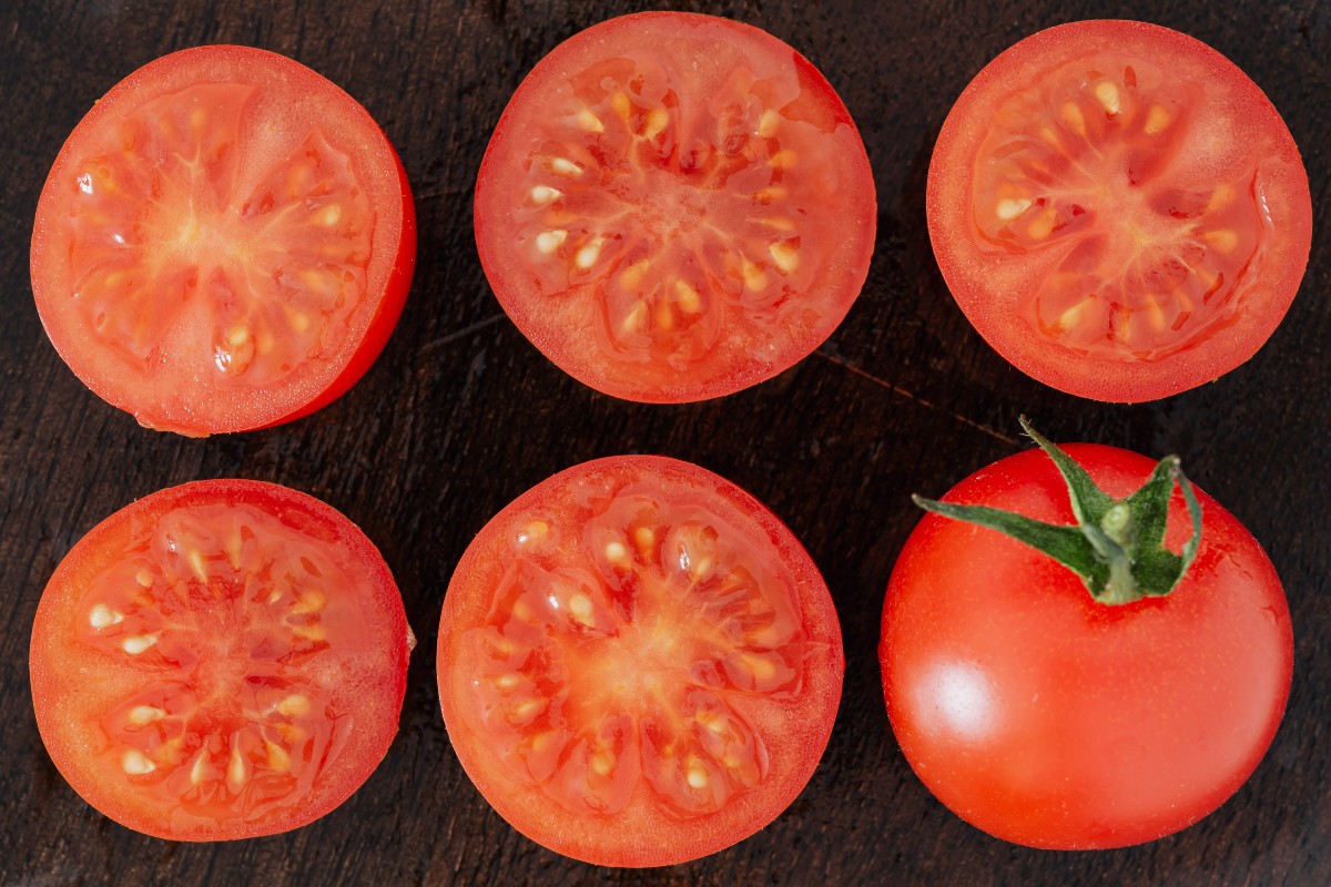tomato-halves-on-dark-wood-table