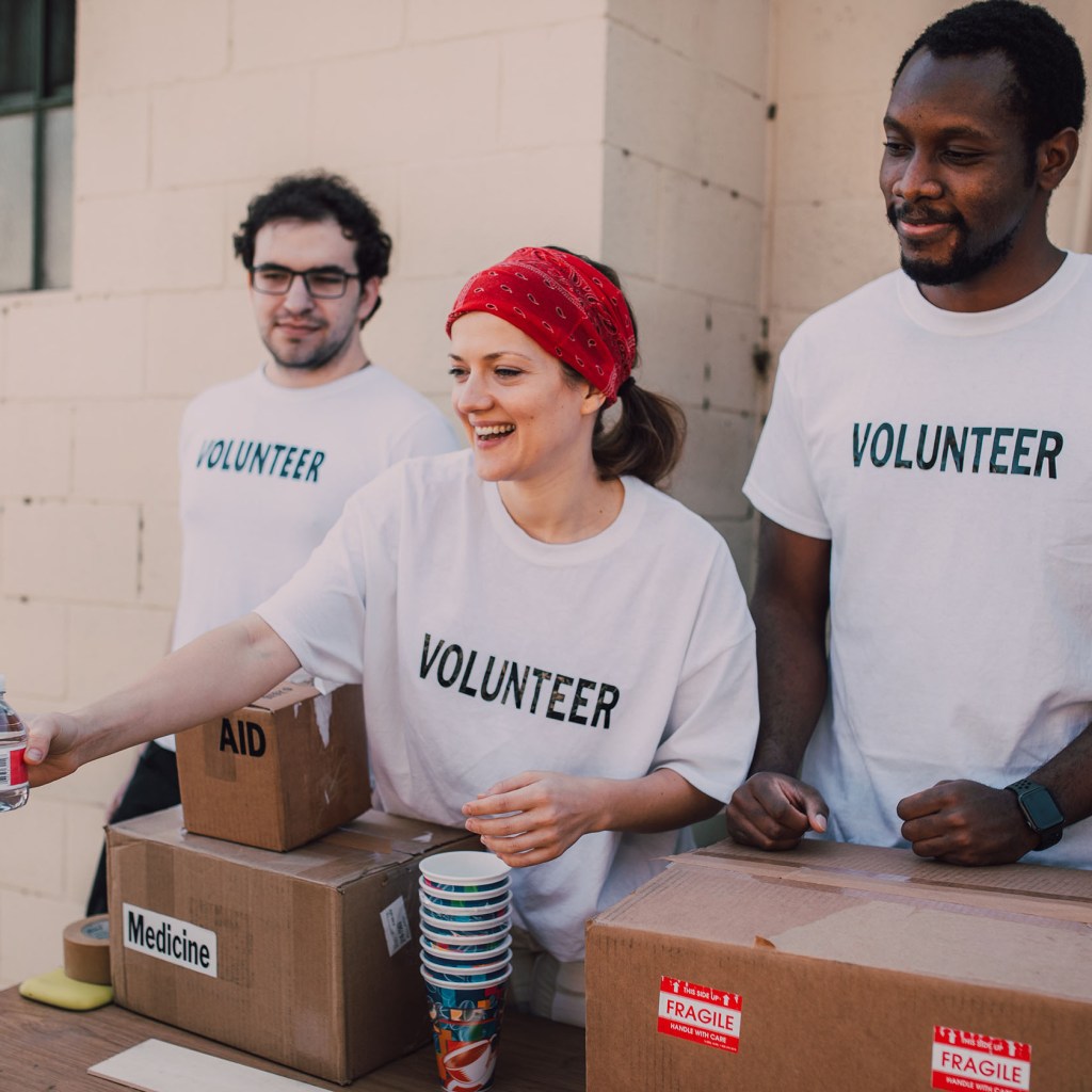 Volunteers passing out water