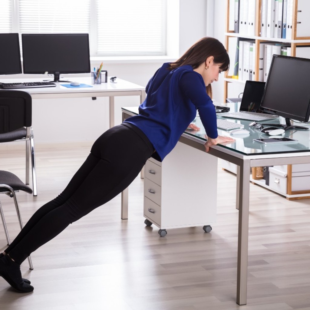 woman-doing-desk-pushup