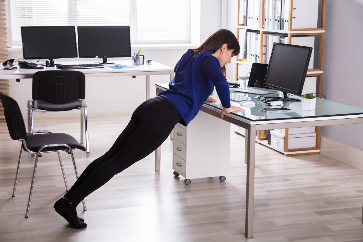 woman-doing-desk-pushup