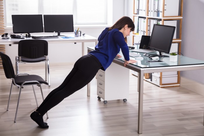 desk exercises guide woman doing pushup
