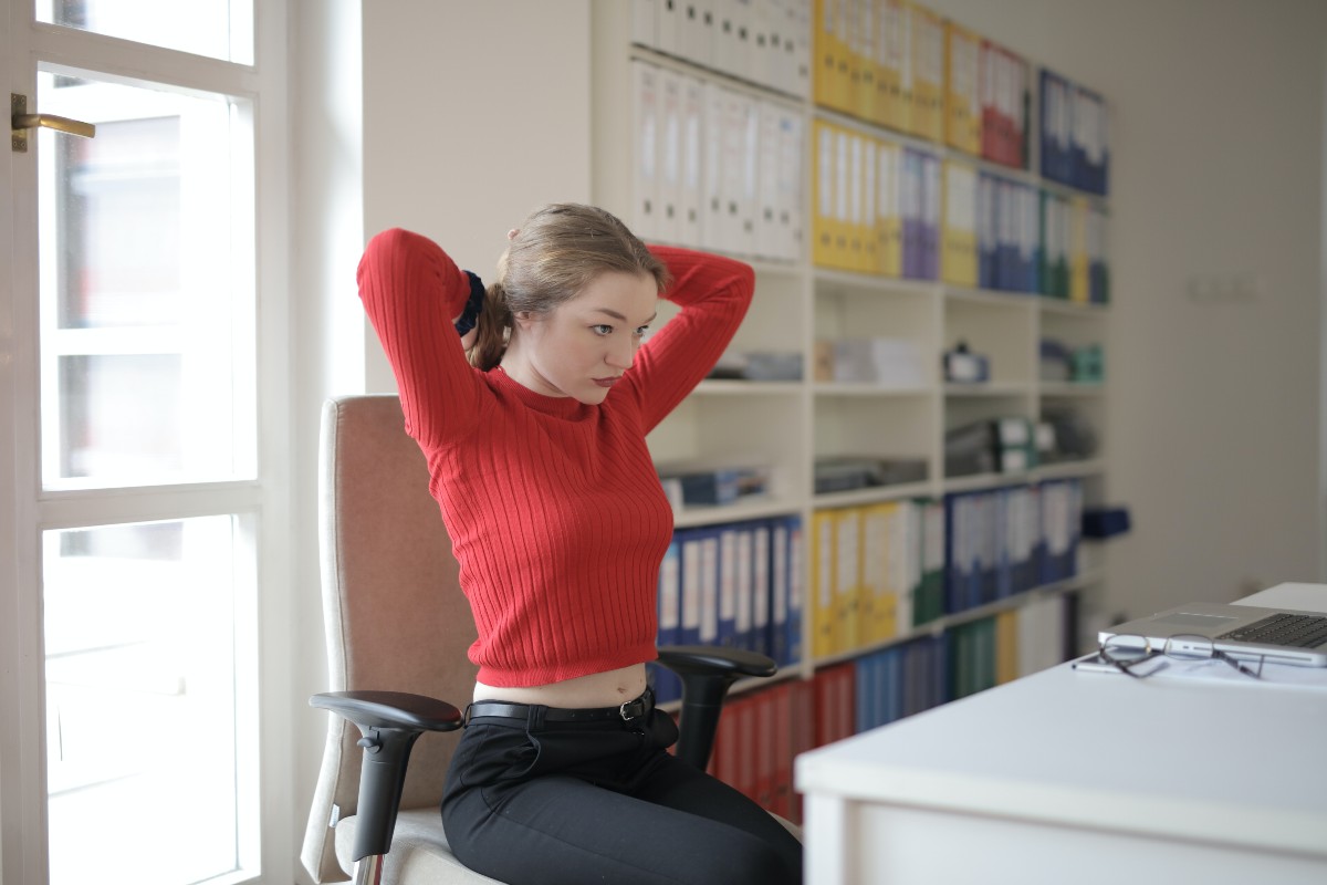woman-stretching-at-desk