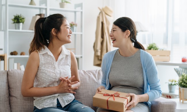 Woman giving a gift to another woman