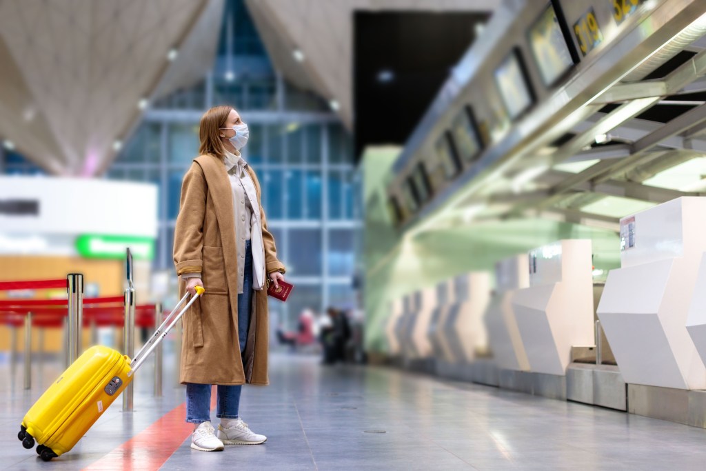 Masked Woman Traveler