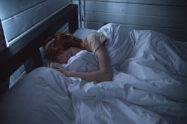 sleep gut health doctor care woman sleeping in bed 2 266x266