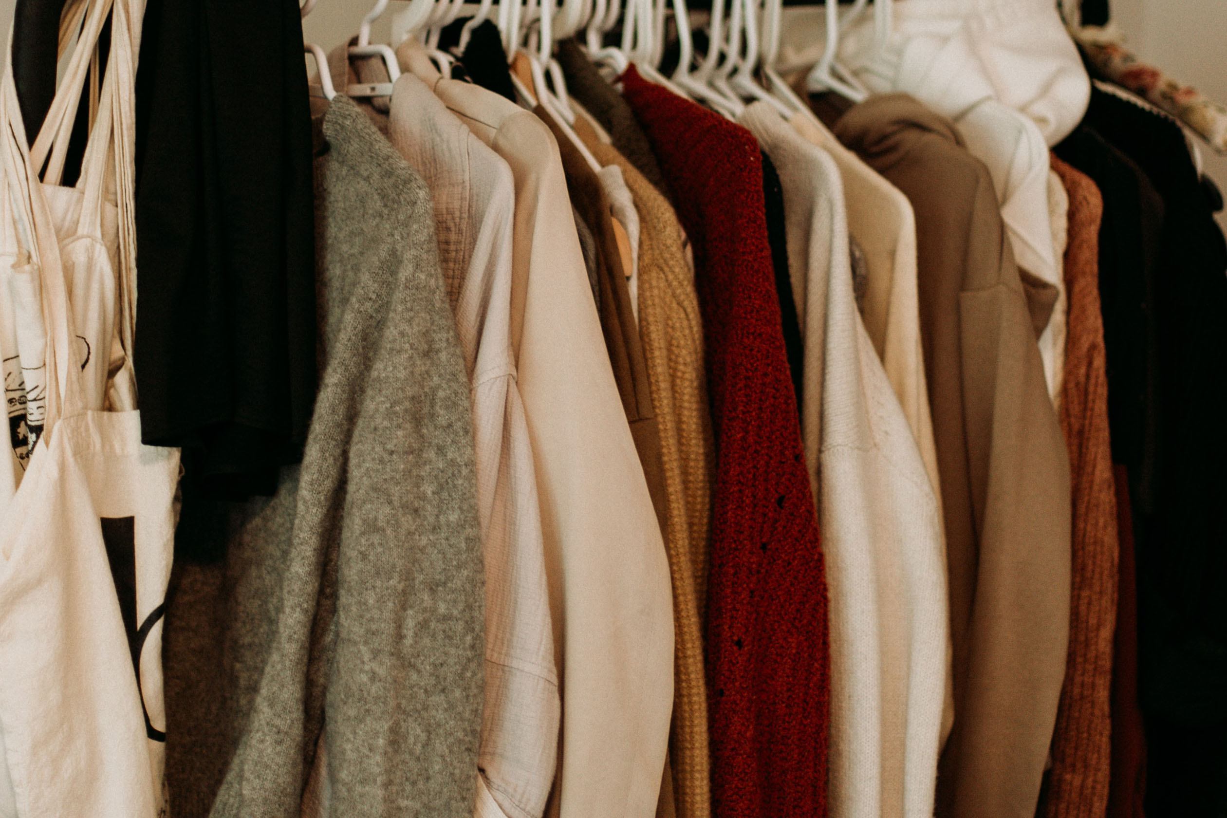 Clothing hanging in a closet