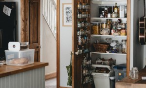 a wide shot of a large, full pantry