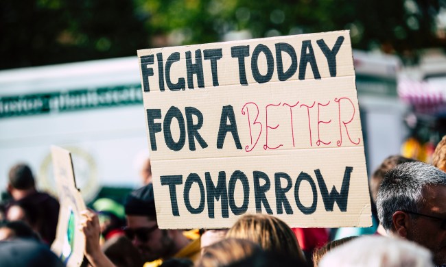 Person holding a sign at a protest