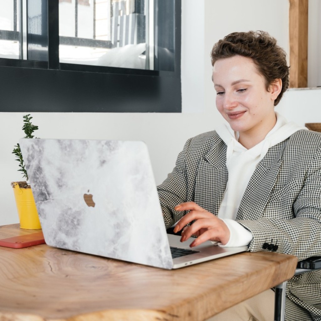 woman working from a coffeeshop