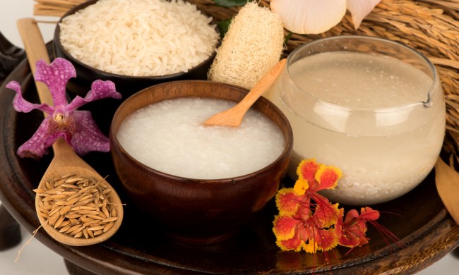 Rice water and an assortment of other ingredients on the table.