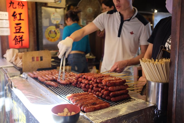 Street vendor cooks sausages in Taiwan