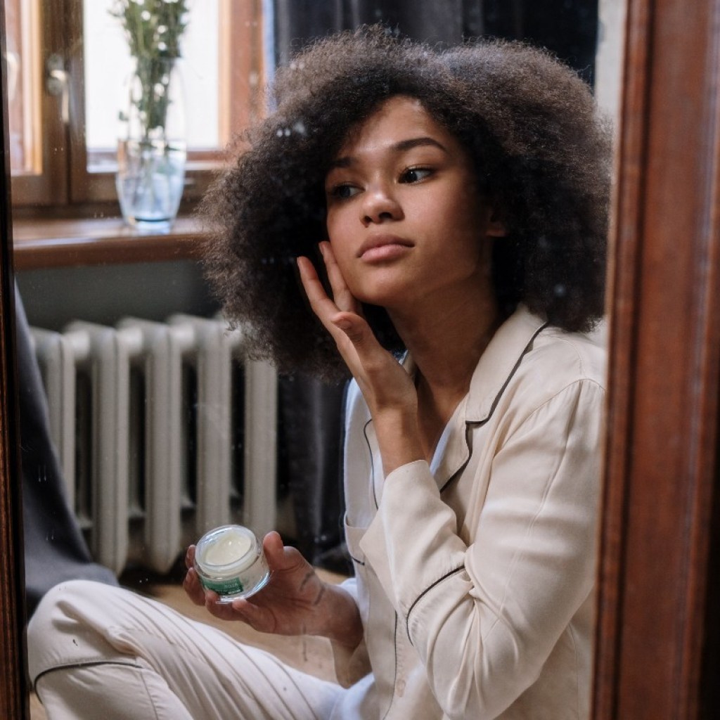 woman-applying-skin-product