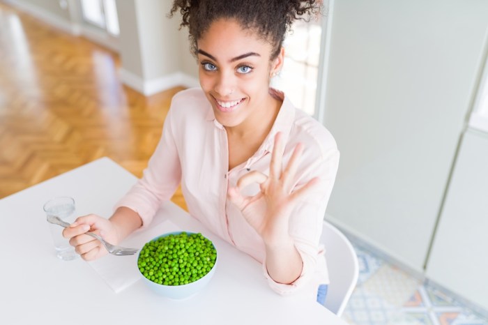 woman eating green