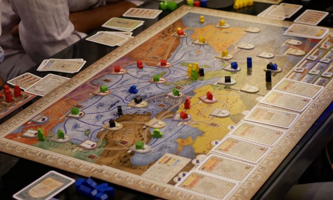 People playing the board game Concordia