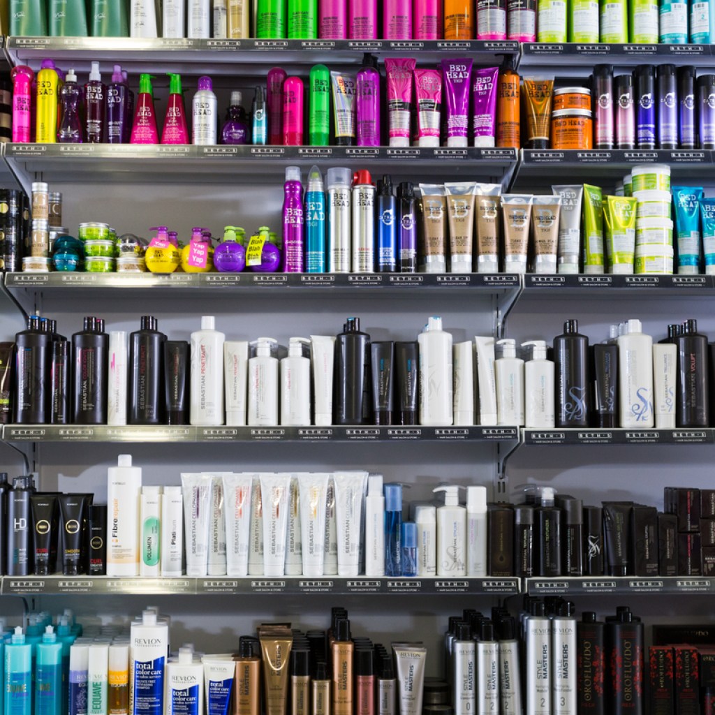 Hair care products on a shelf at the store.