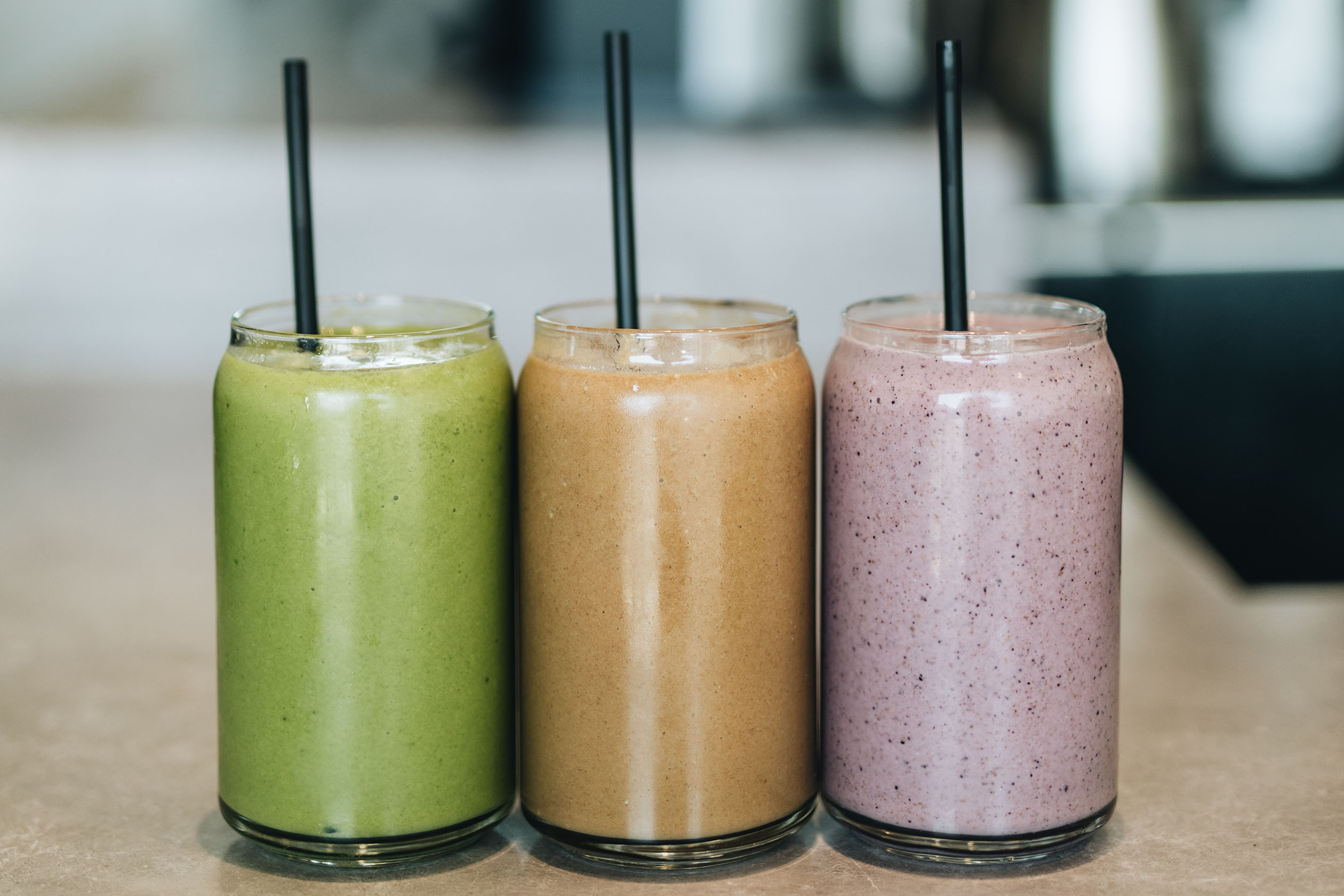 Three colorful smoothies