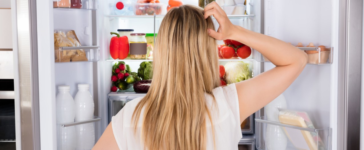 websites recipes whats on hand woman looking in fridge