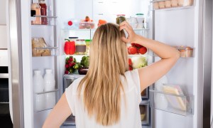 websites recipes whats on hand woman looking in fridge
