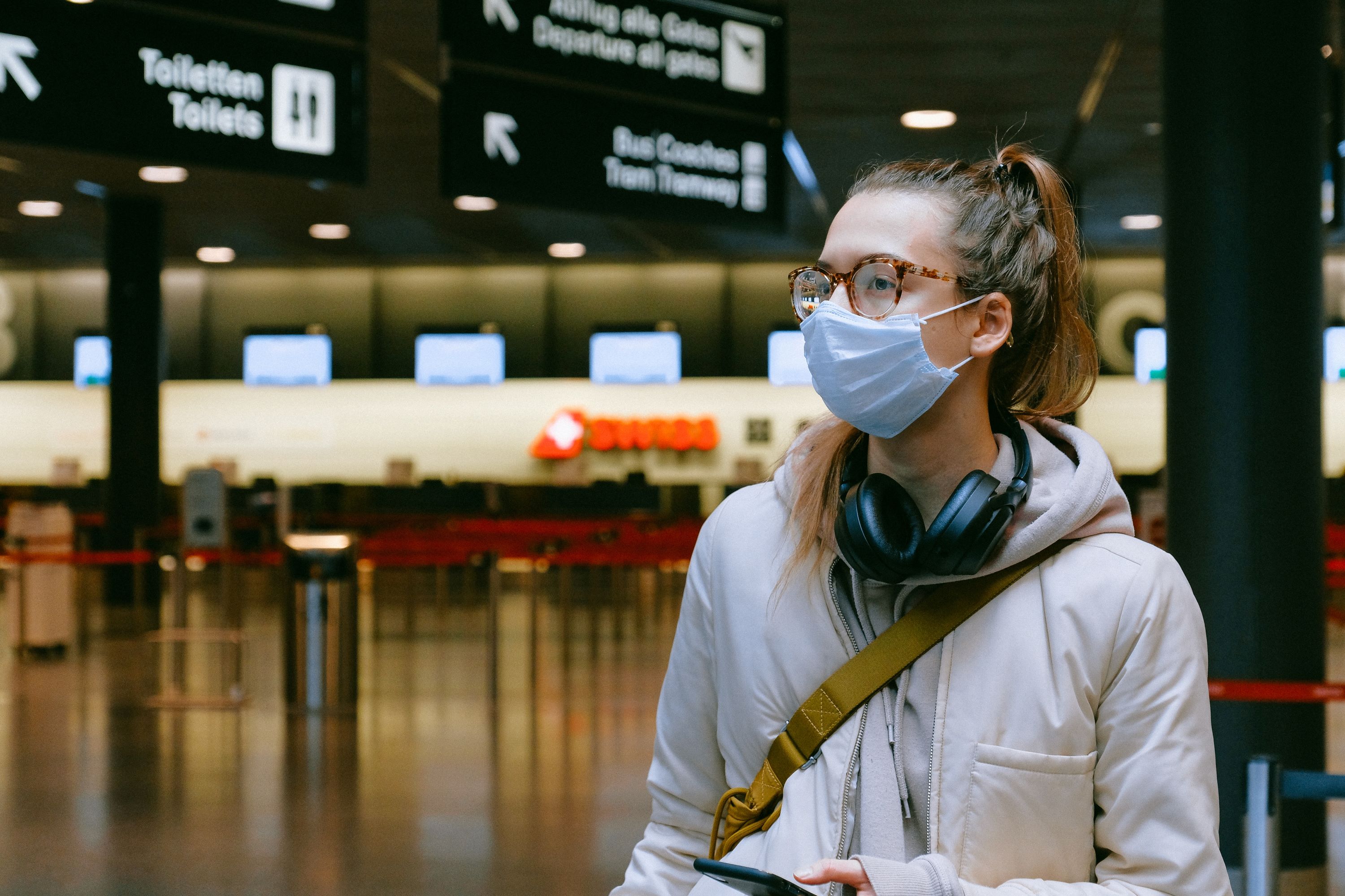 Woman at airport with mask on