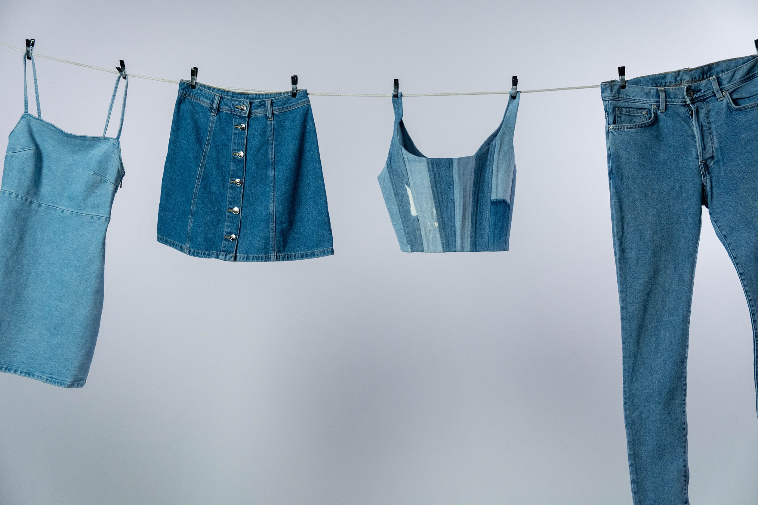 Denim clothes hanging on a clothesline