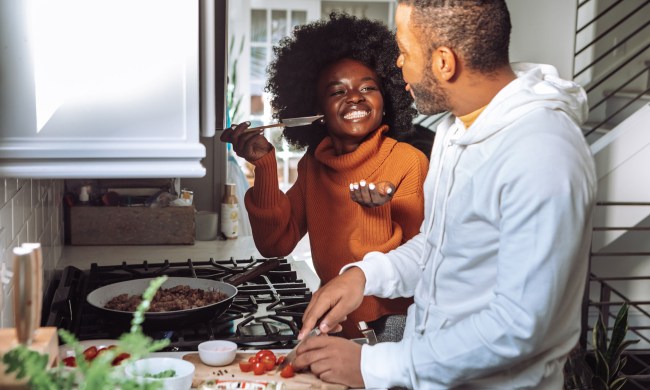 Happy couple cooking together