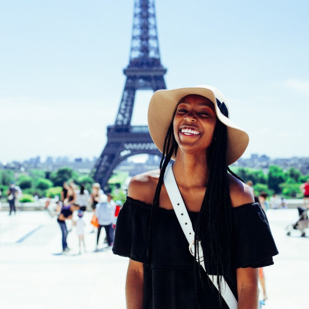 a happy woman in paris