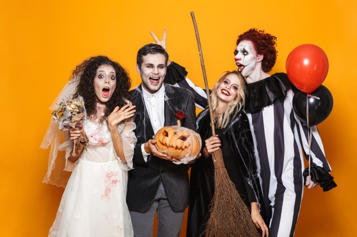 A group of adults dressed up for Halloween.