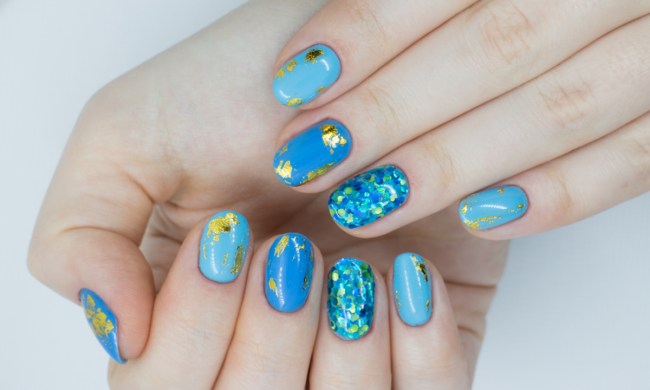 A set of nails with fun nail art.