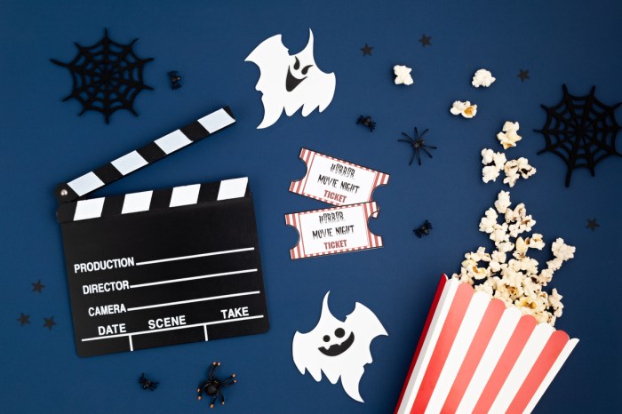 A movie clapboard and Halloween decorations.