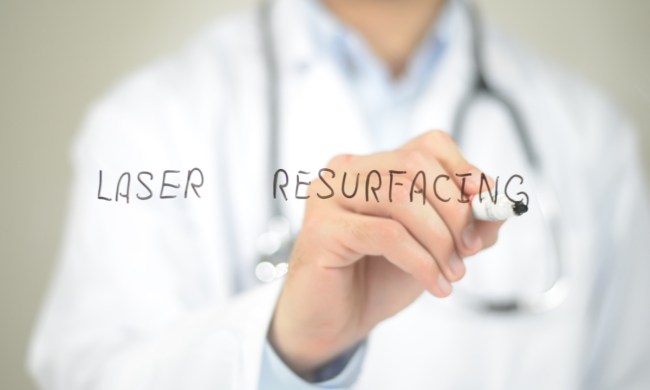 A doctor writing the words "laser resurfacing".
