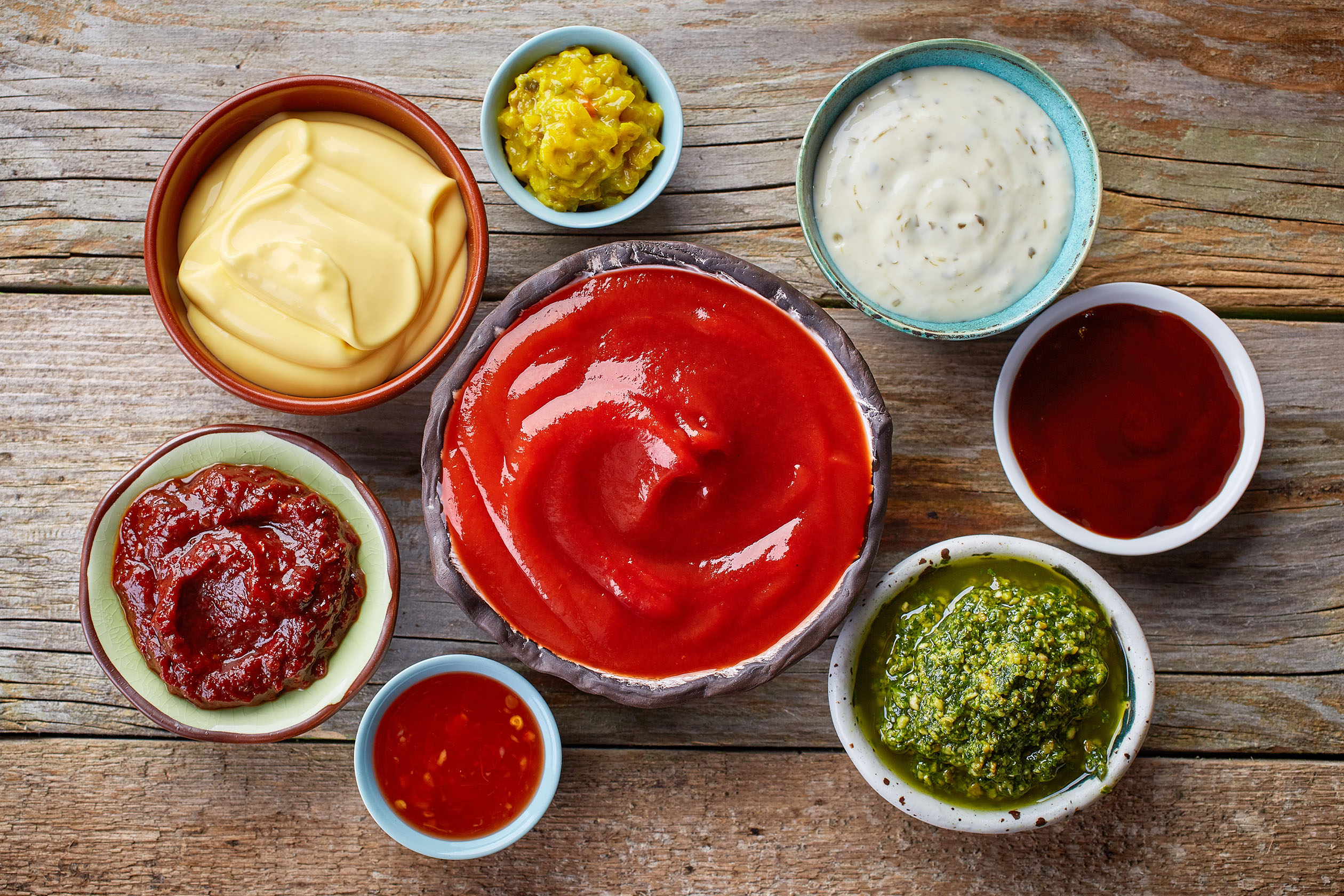 Variety of condiments in serving bowls