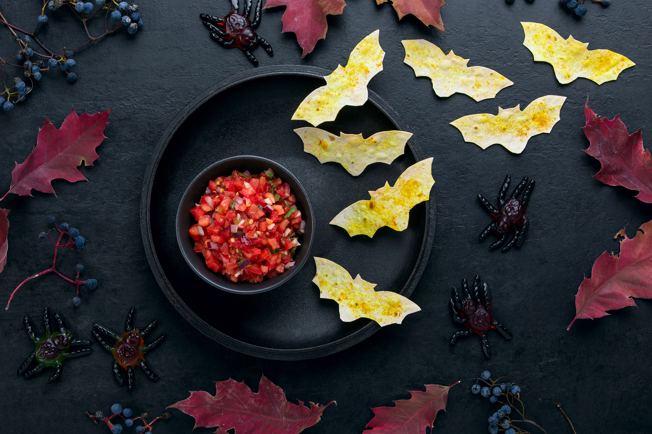 Bat-shaped tortilla chips and salsa