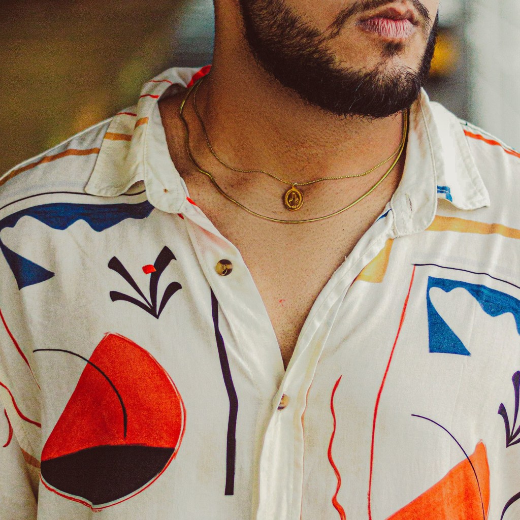 Man wearing patterned button-up shirt
