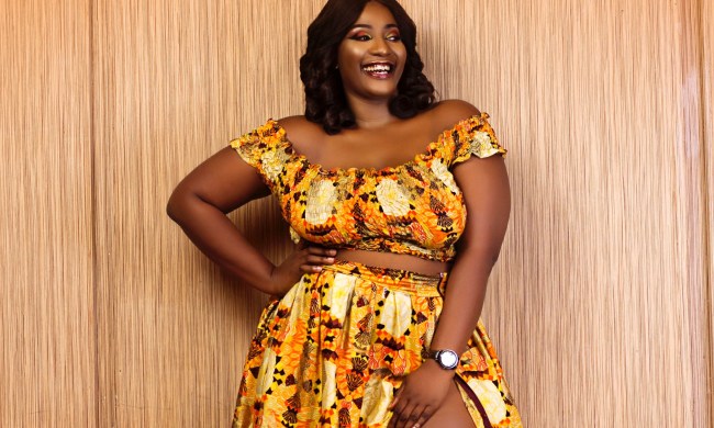 Plus-size woman wearing a bold patterned dress set