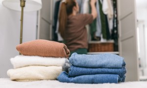Woman cleaning out her closet