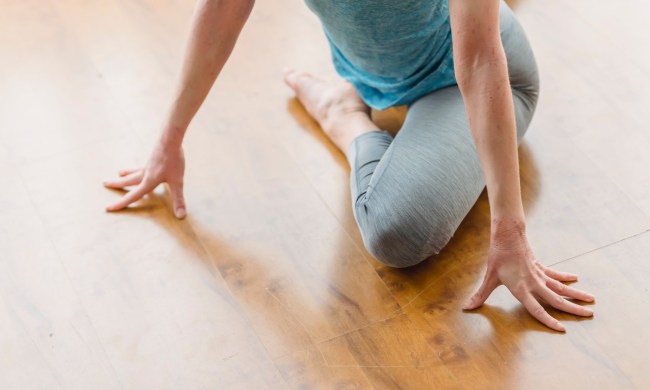 a woman in pigeon pose