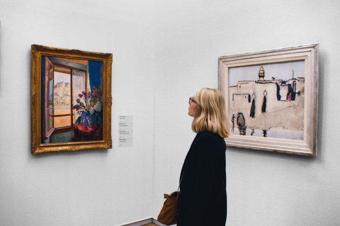 Woman viewing art at Le Centre Pompidou in Paris