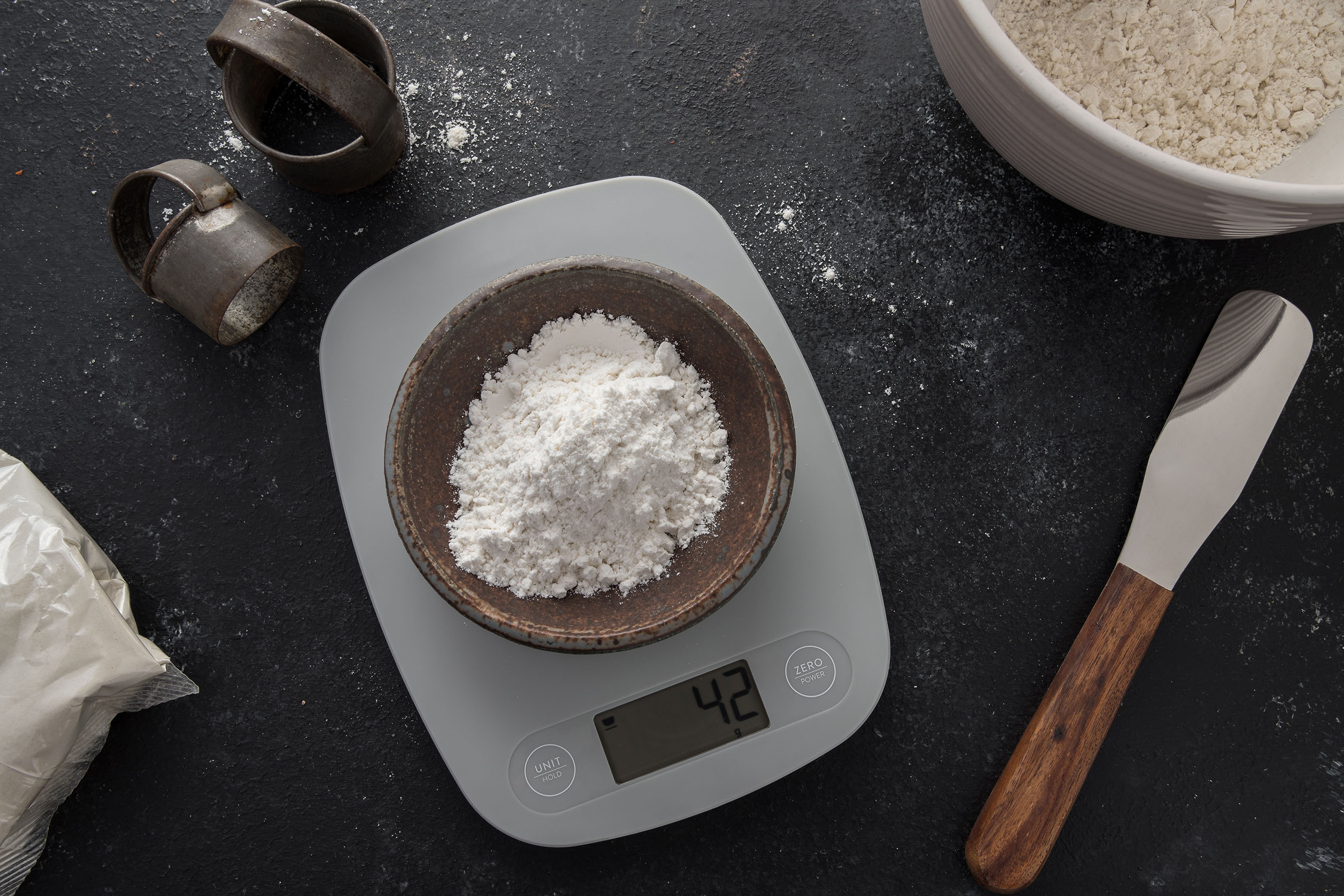 Bowl of flour on kitchen scale