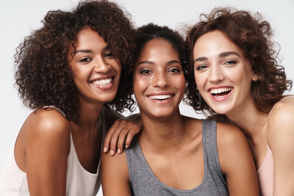 Young diverse group of women smiling
