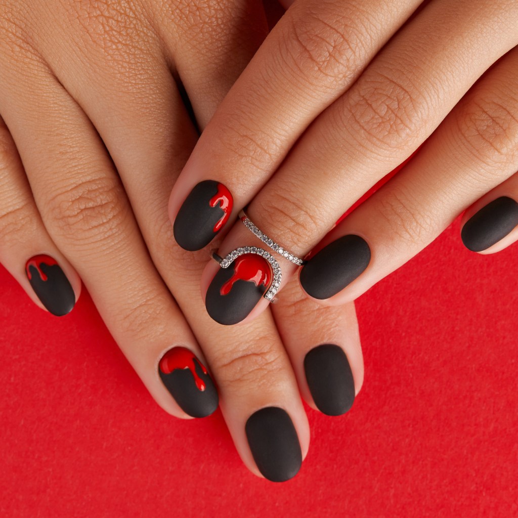 A set of bloody Halloween themed nail art.
