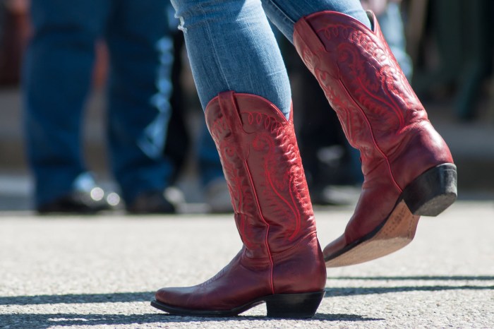 Person wearing red cowboy boots