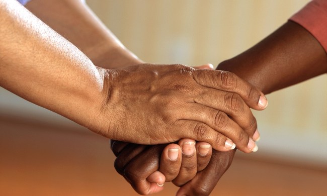 two people holding hands