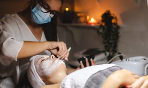 Woman receiving touchless facial