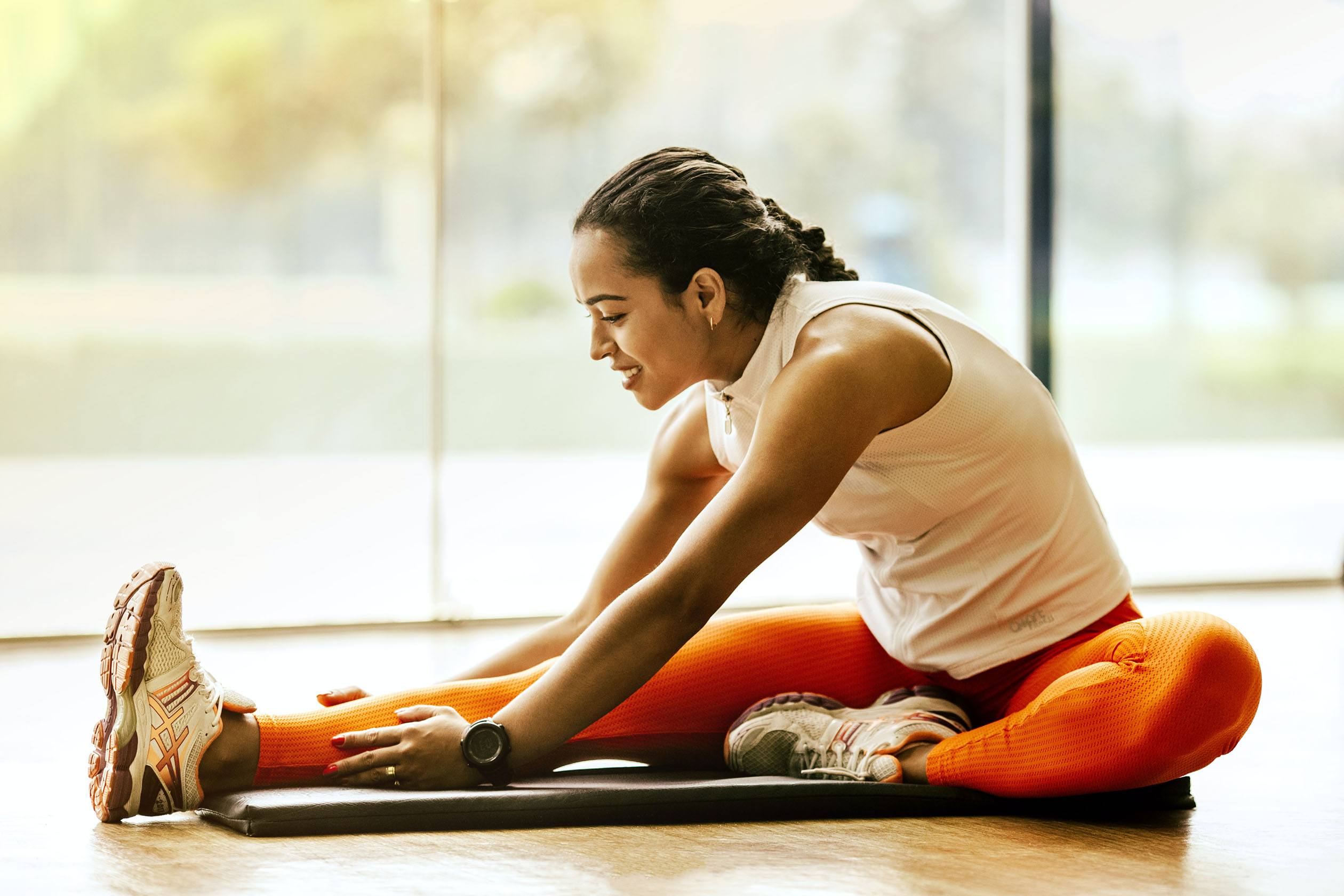 Woman stretching and exercising