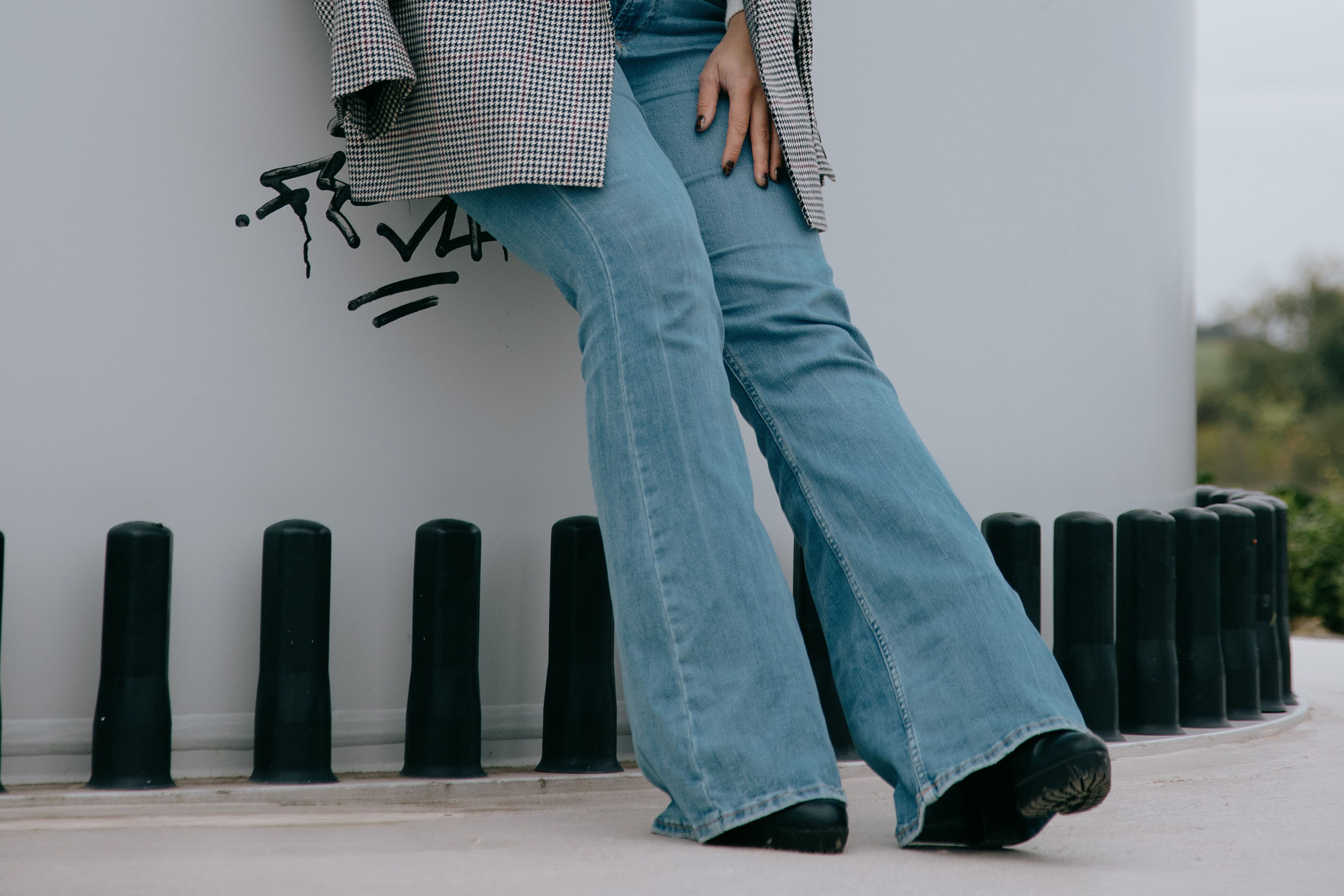 Woman wearing flared jeans